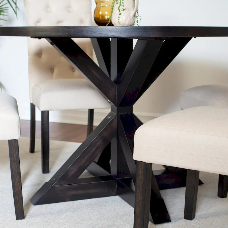 Ensemble table et chaises de salle à manger pour petit appartement. Table ronde avec pied central en croix pour cuisine.