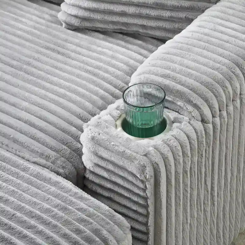 Canapé confortable en velours côtelé avec de nombreux coussins et options de rangement