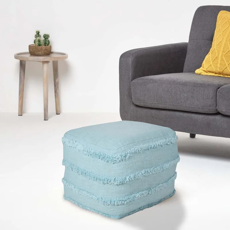 Pouf ottoman Sevita à rayures texturées unies