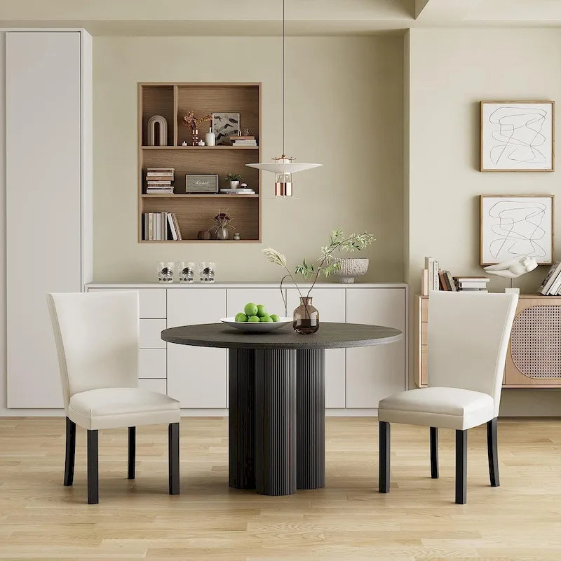 Chaises de salle à manger en similicuir ou table de salle à manger ronde en verre