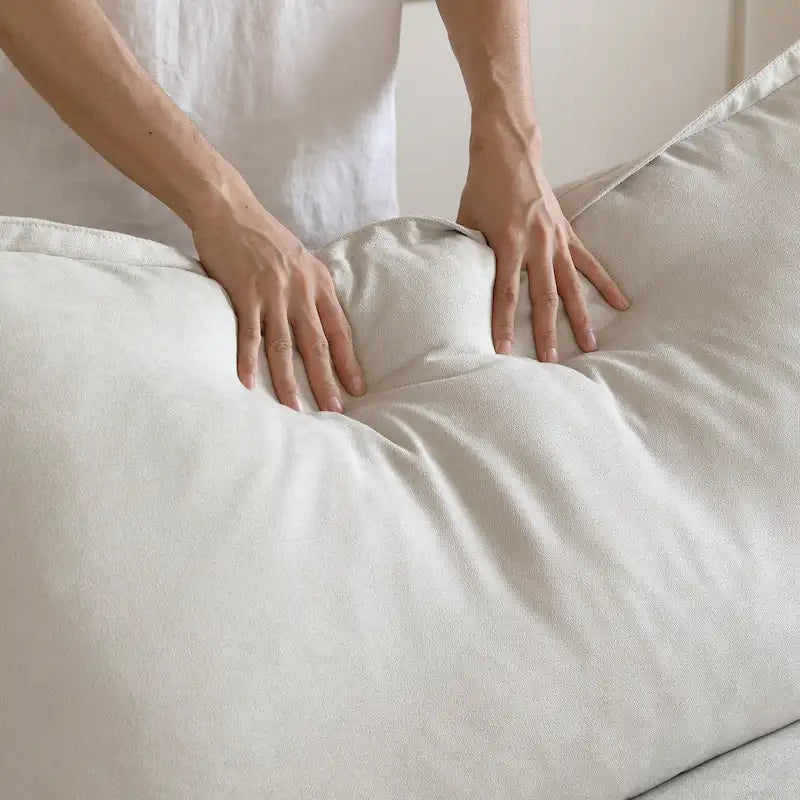 Canapé d'angle moderne en lin avec pouf, en forme de L.