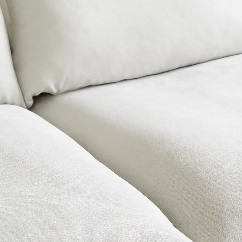 Canapé d'angle moderne en lin avec pouf, en forme de L.