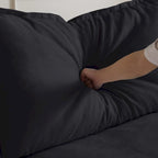 Canapé d'angle moderne en lin avec pouf, en forme de L.