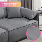 Canapé Mixoy 4 places à assise profonde et rembourrée, style italien minimaliste, 97 cm, avec accoudoirs en forme d'oreilles d'éléphant et coussin décoratif.
