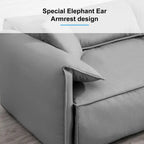 Canapé Mixoy 4 places à assise profonde et rembourrée, style italien minimaliste, 97 cm, avec accoudoirs en forme d'oreilles d'éléphant et coussin décoratif.