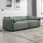 Canapé Mixoy 4 places à assise profonde et rembourrée, style italien minimaliste, 97 cm, avec accoudoirs en forme d'oreilles d'éléphant et coussin décoratif.