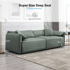 Canapé Mixoy 4 places à assise profonde et rembourrée, style italien minimaliste, 97 cm, avec accoudoirs en forme d'oreilles d'éléphant et coussin décoratif.