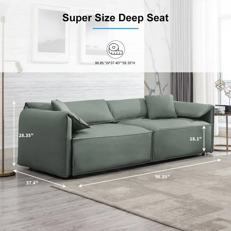 Canapé Mixoy 4 places à assise profonde et rembourrée, style italien minimaliste, 97 cm, avec accoudoirs en forme d'oreilles d'éléphant et coussin décoratif.