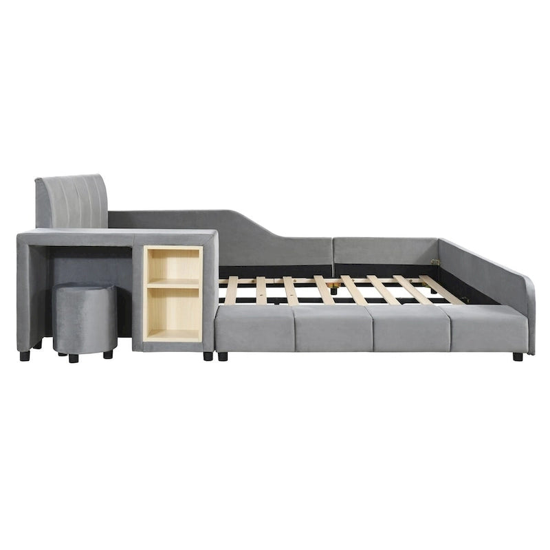 Lit double capitonné avec table de chevet et petit tabouret rond, en velours.