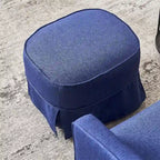 Fauteuil pivotant avec repose-pieds et base en métal noir