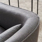 Fauteuil pivotant avec repose-pieds et base en métal noir