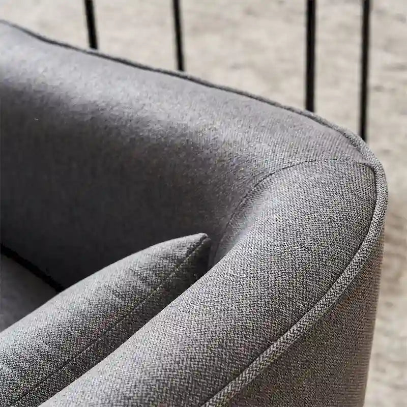 Fauteuil pivotant avec repose-pieds et base en métal noir