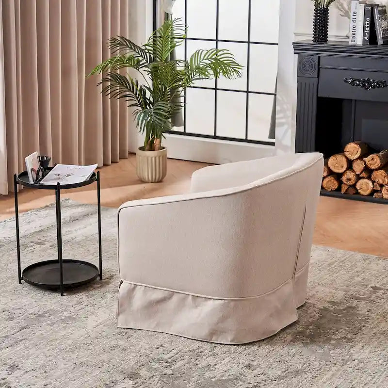 Fauteuil pivotant rond avec repose-pieds, idéal pour la lecture au salon ou dans la chambre, avec un piètement en métal noir.