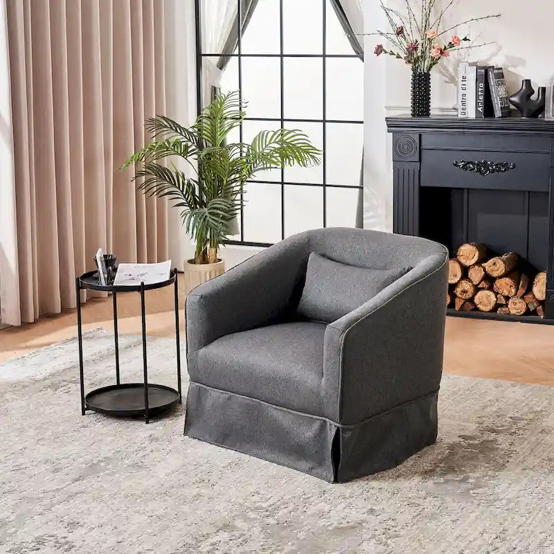 Fauteuil pivotant rond avec repose-pieds, idéal pour la lecture au salon ou dans la chambre, avec un piètement en métal noir.