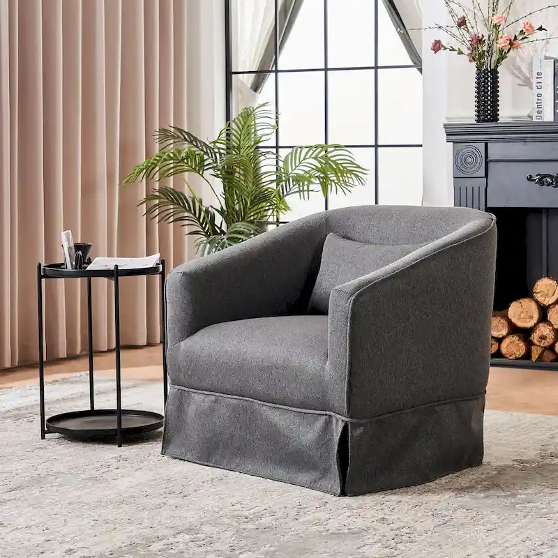 Fauteuil pivotant rond avec repose-pieds, idéal pour la lecture au salon ou dans la chambre, avec un piètement en métal noir.